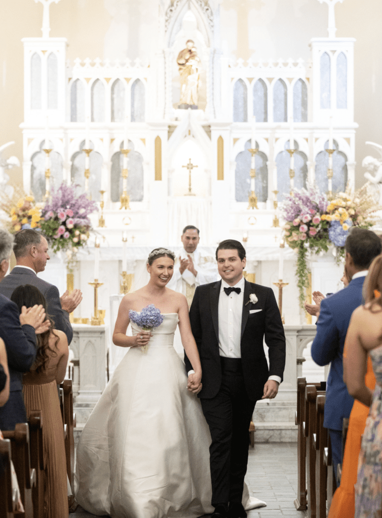 Catherine Clay and Brooks Chapman enjoyed a traditional church wedding at St. Joseph Catholic Church. (Photo by John Cain)